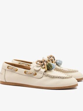 Larroude Cyprus Boat Shoe In Ivory Leather with pom-pom detail
